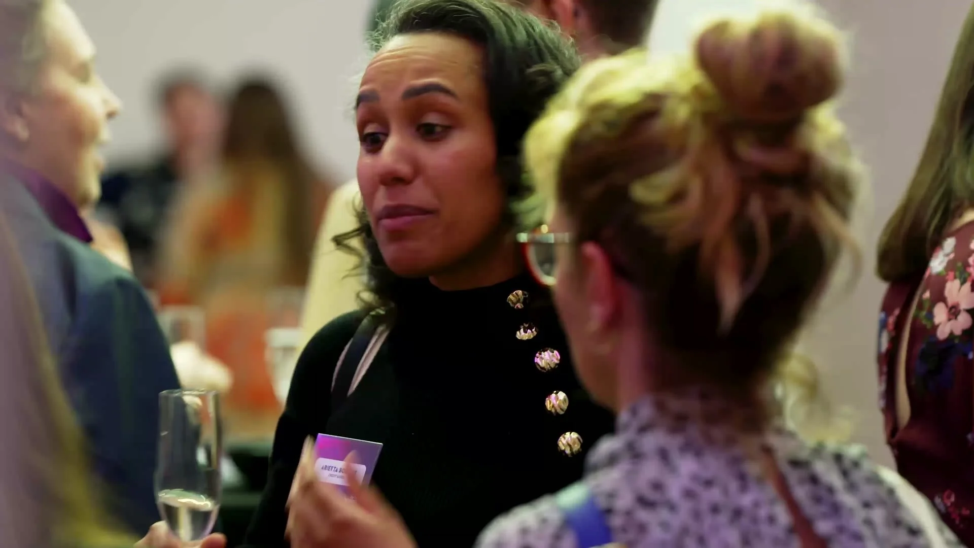 A volunteer chatting with a guest