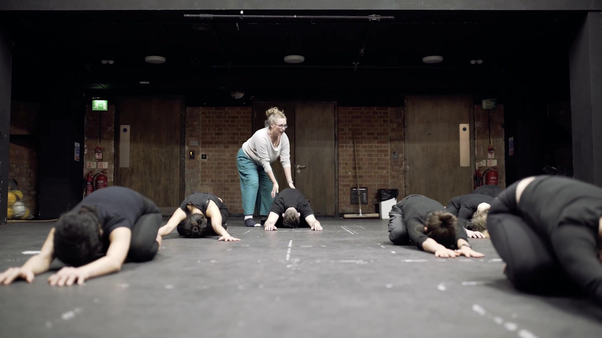 Floor work exercise led by a tutor