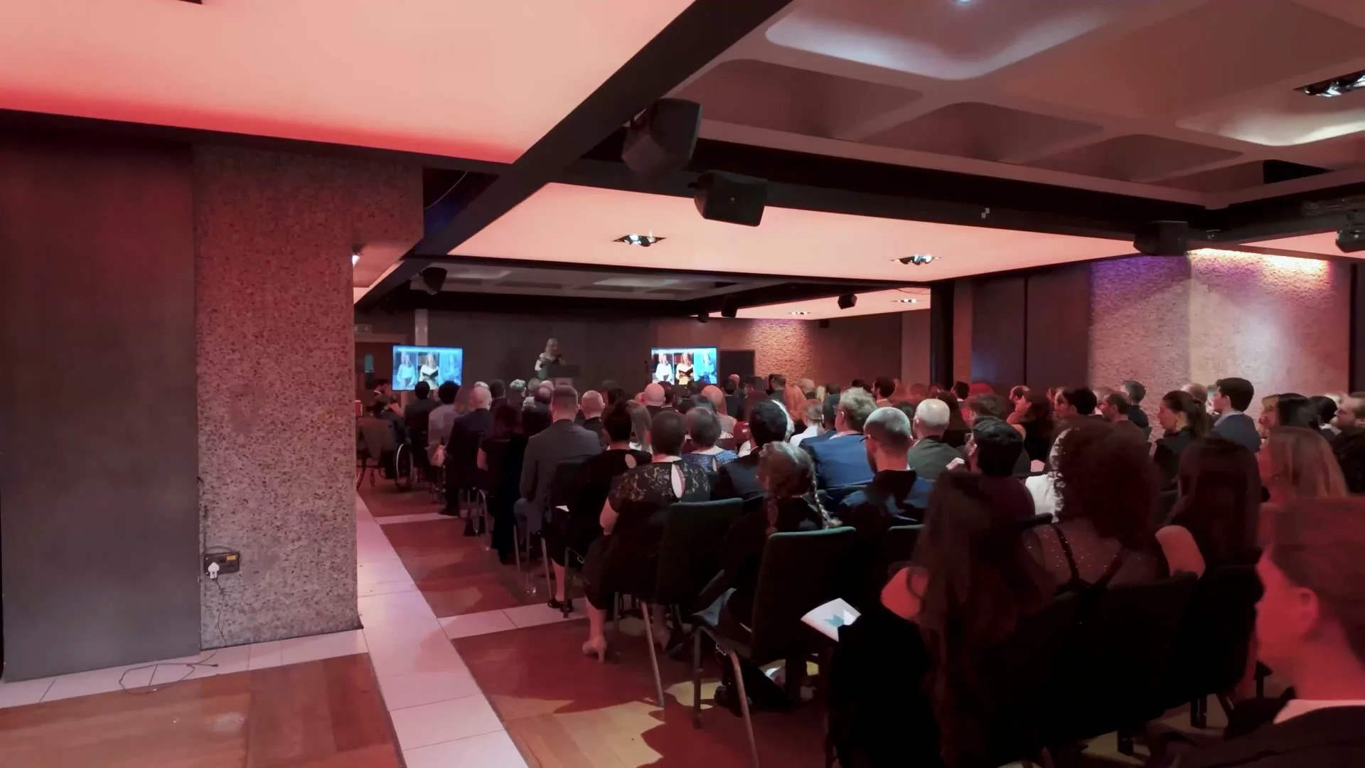 The packed auditorium