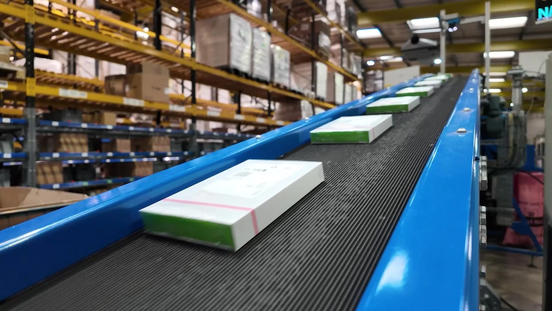 Orders travelling along the conveyor