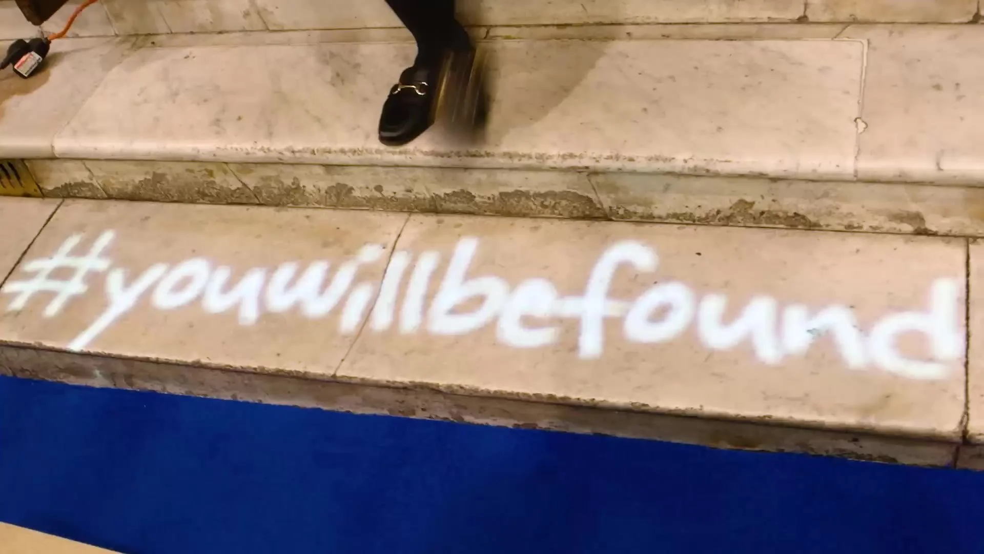 A chalked message outside the theatre