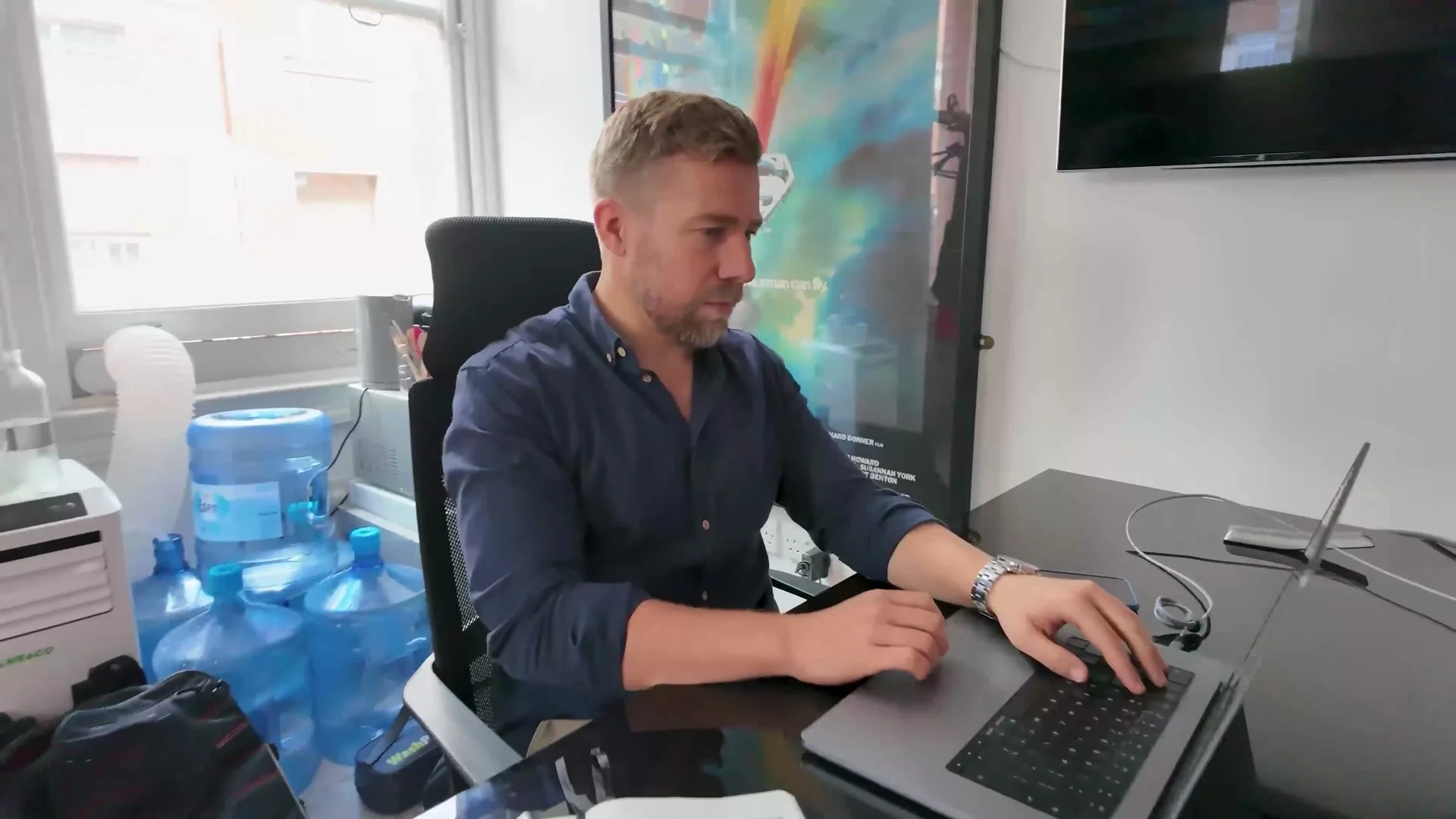 Cap Energy team member at his desk