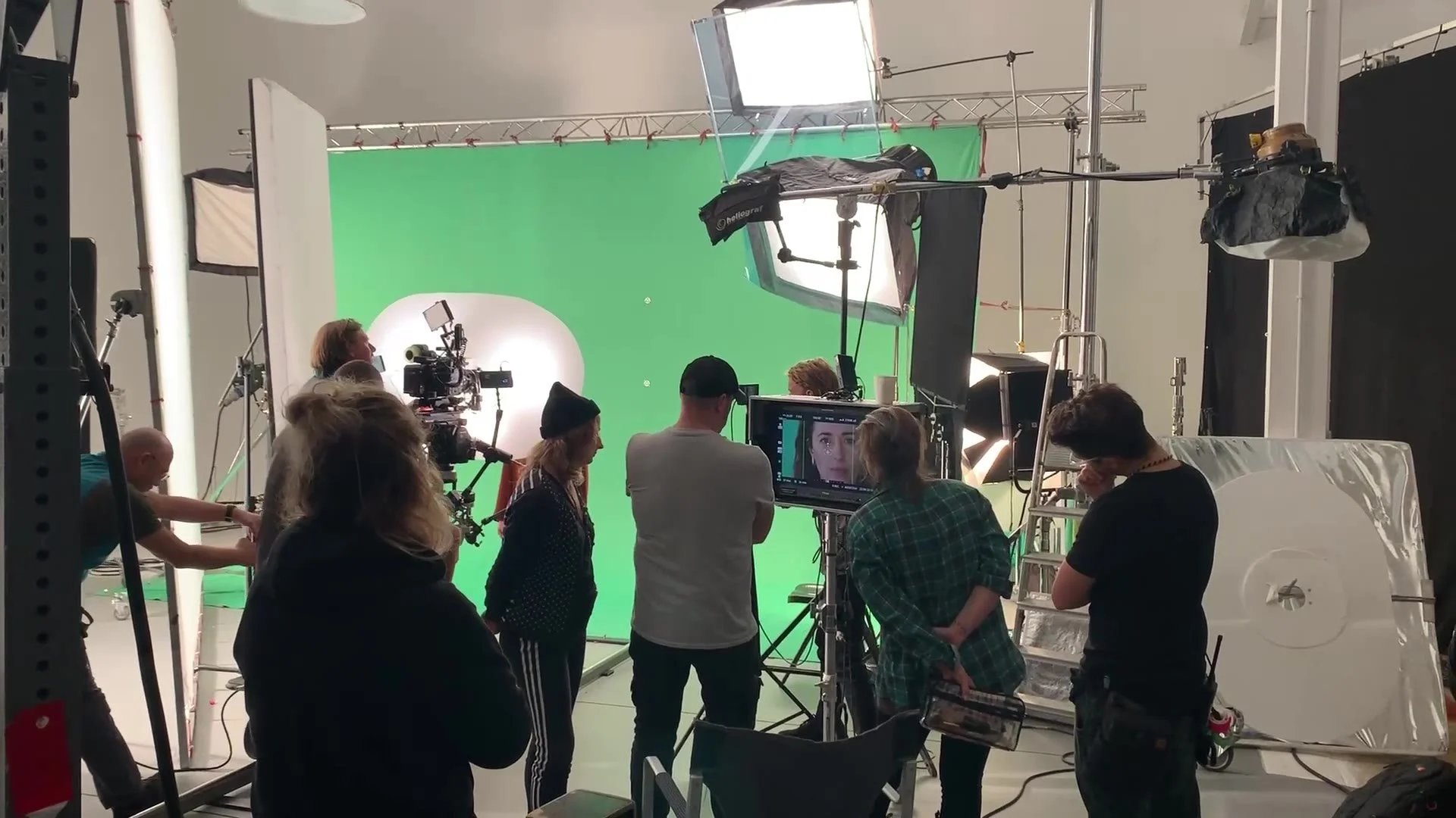 Cast and crew on the green-screen set for the Netflix pre-rolls