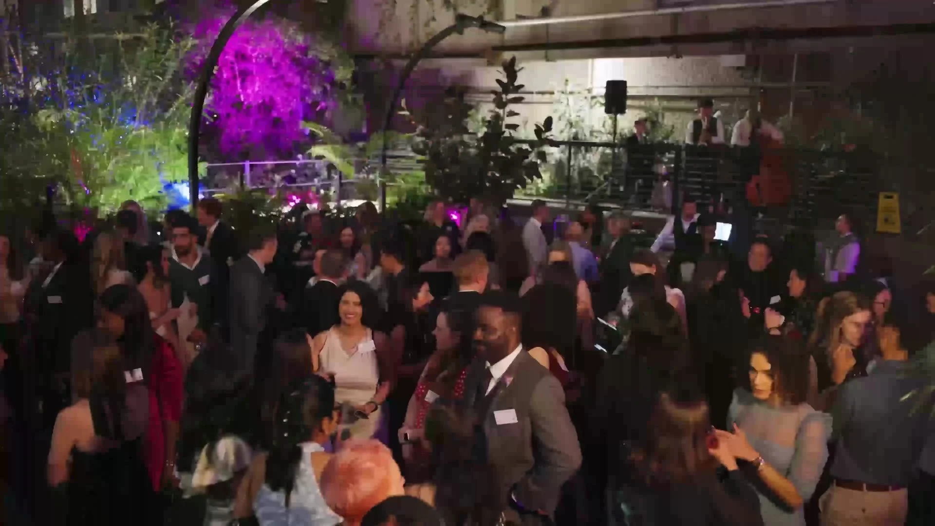 Guests gathering in the conservatory