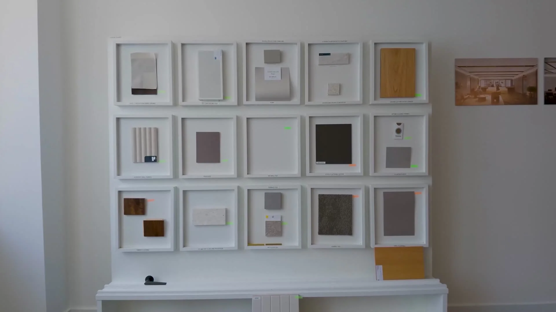 A wall of finish samples in a meeting room
