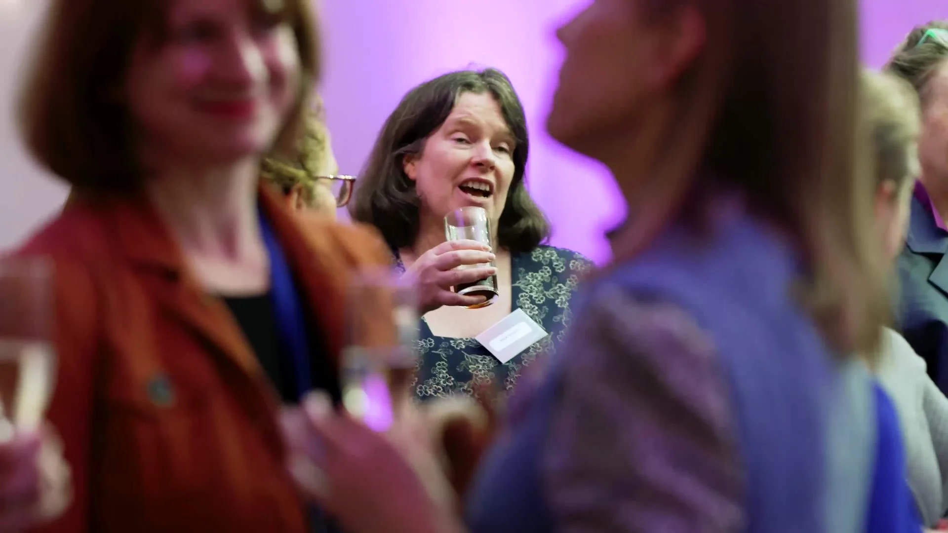 Guests talking over drinks