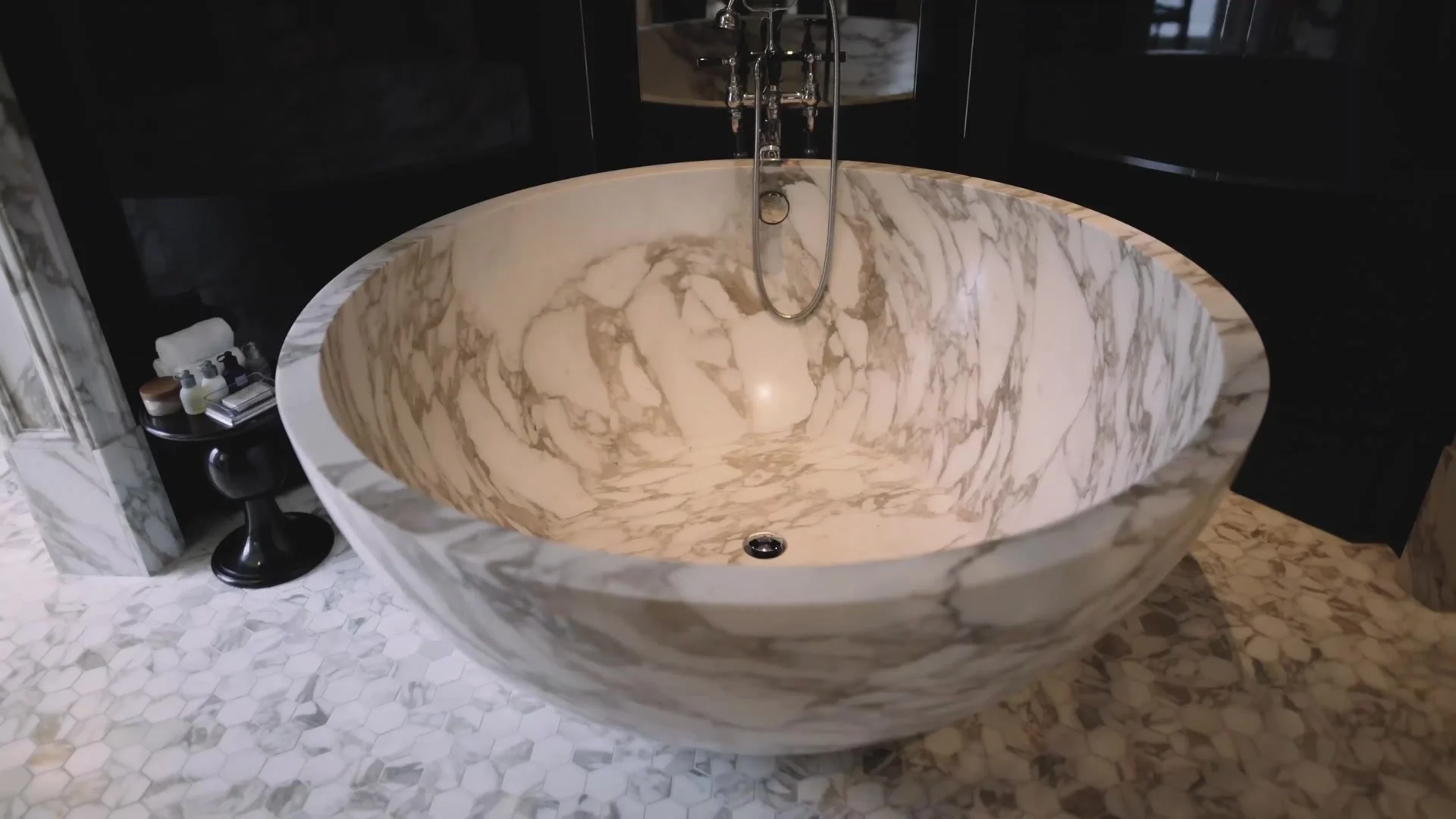 A marble bathroom in a suite