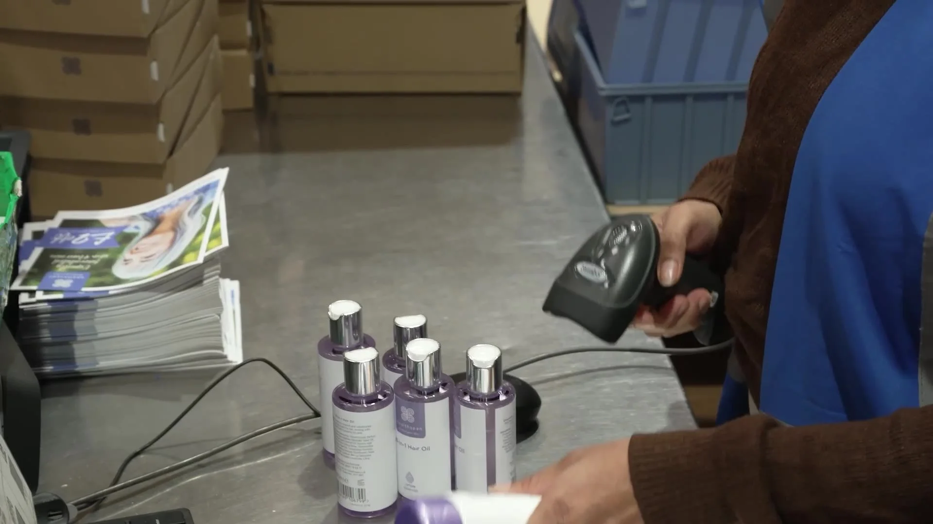 An operator scanning an order