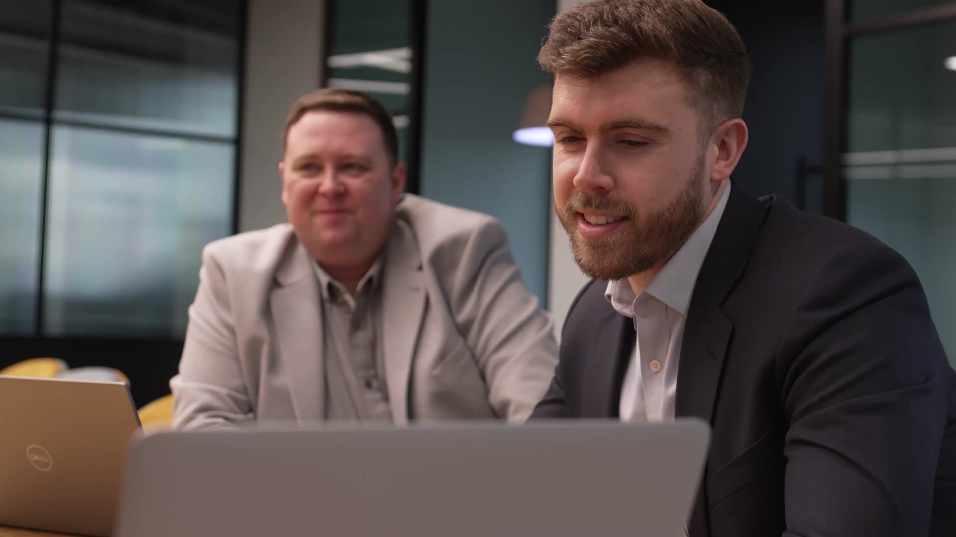 Crossfuze and TIP Group reviewing the platform on a laptop