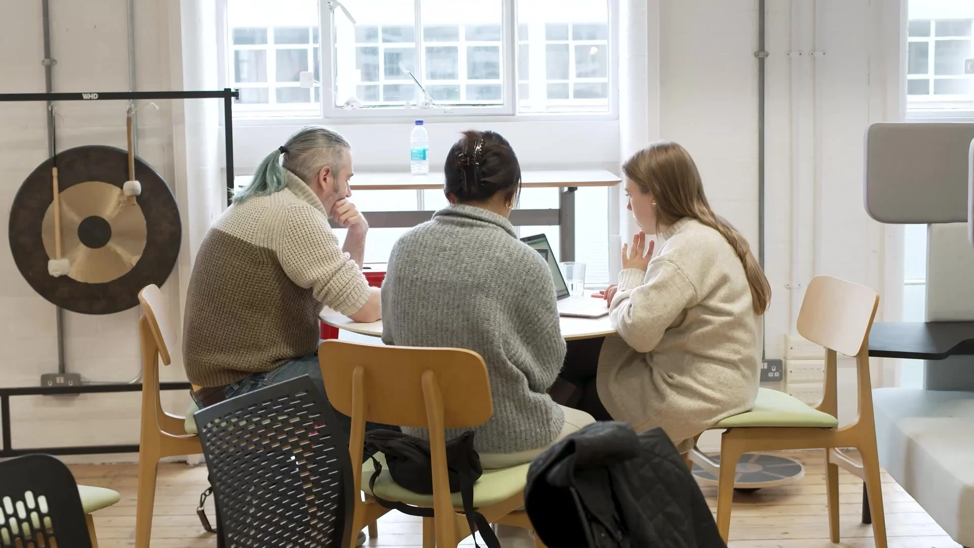 Attendees working together at a table