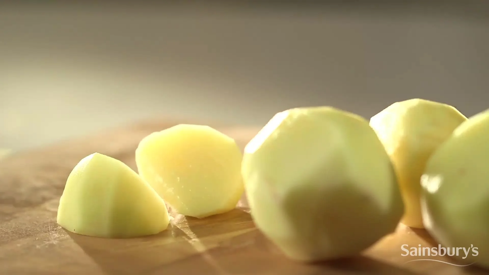 Peeled potatoes ready for roasting
