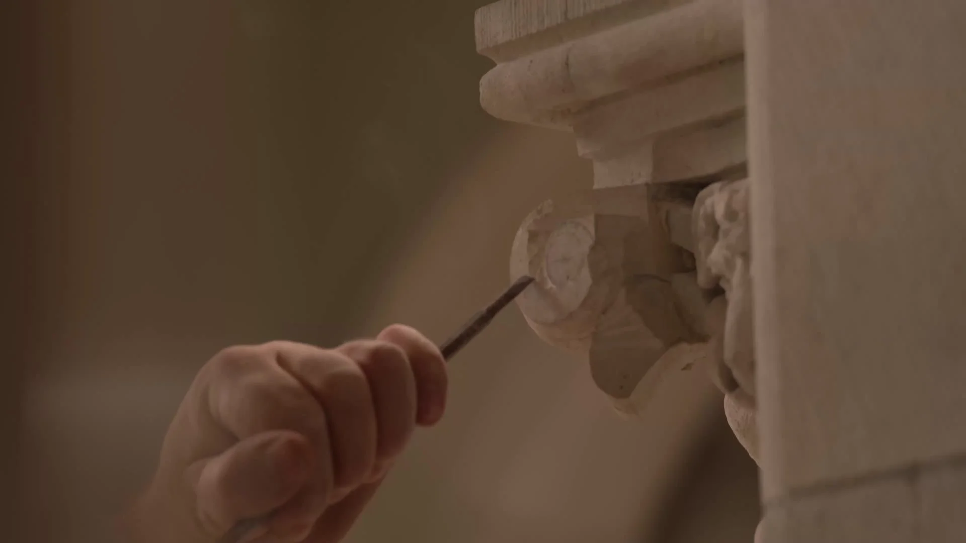 Restoring carved stonework by hand