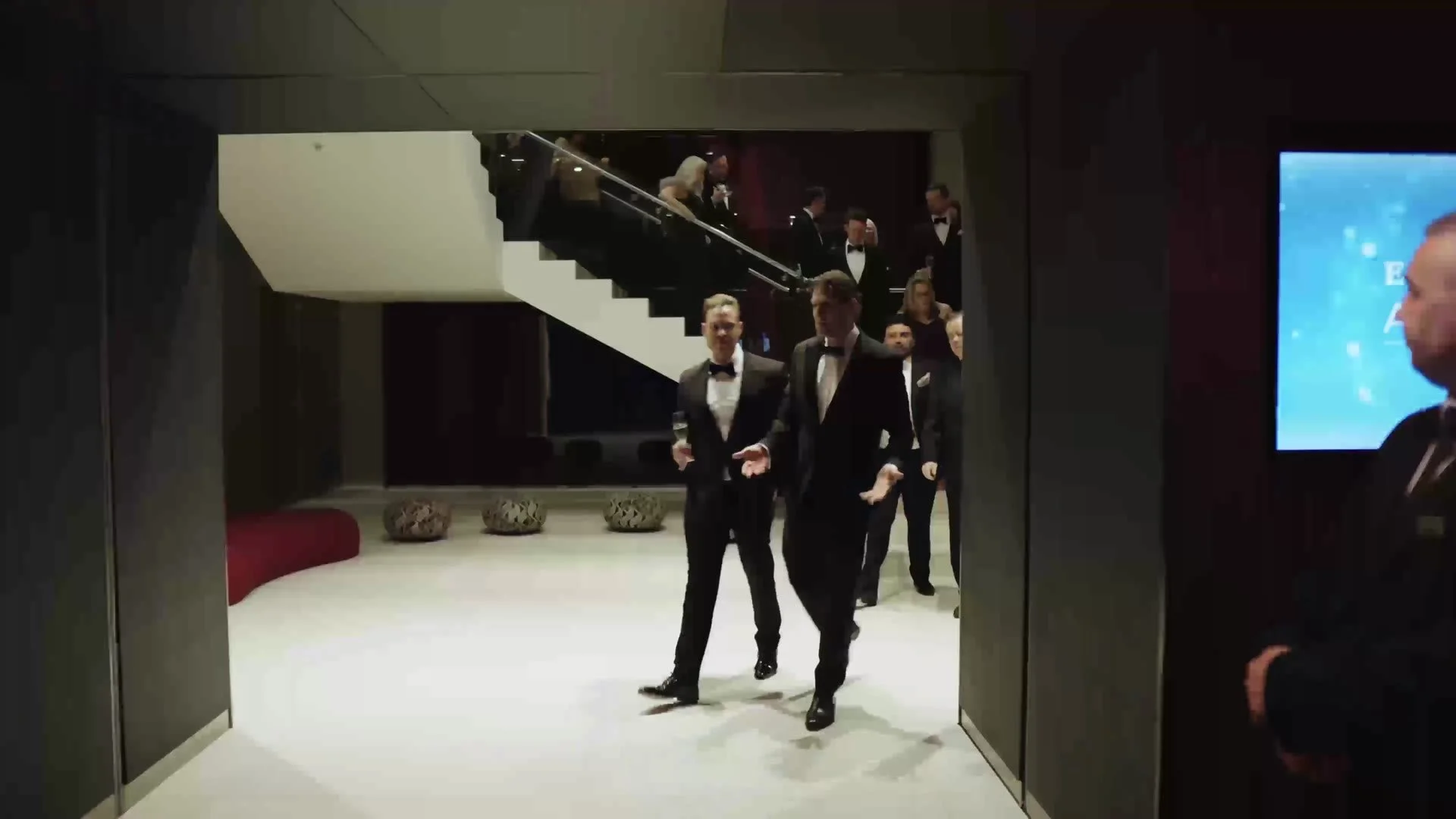 Guests arriving down the stairs