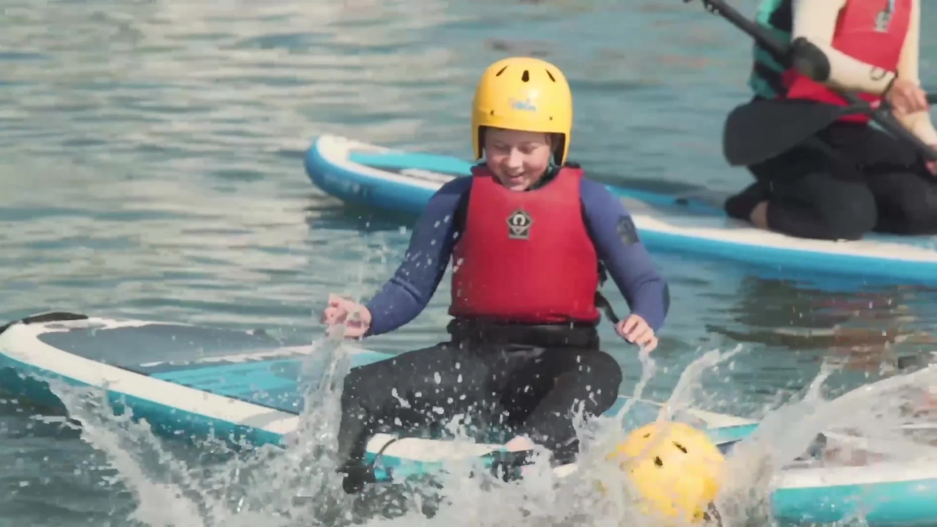 A young person on a paddleboard