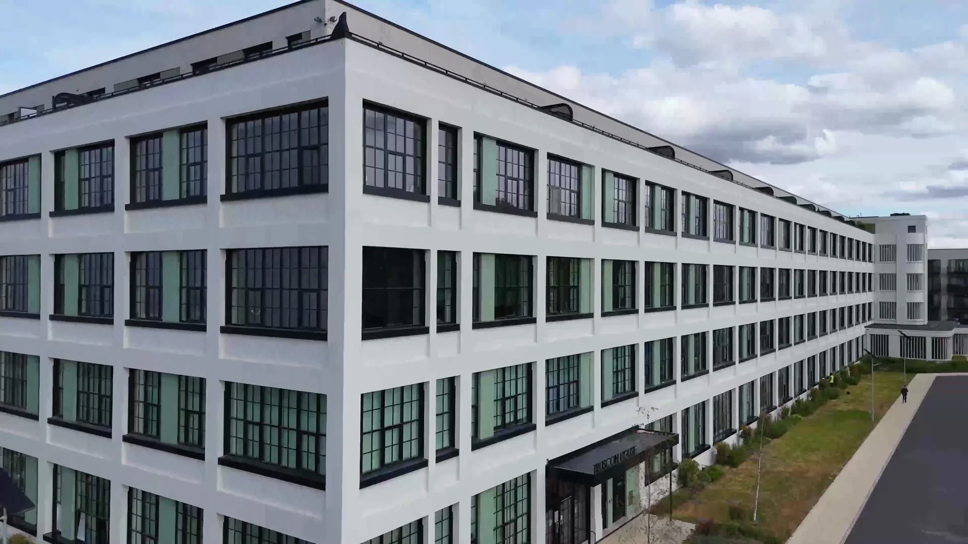 The long restored facade of the former factory