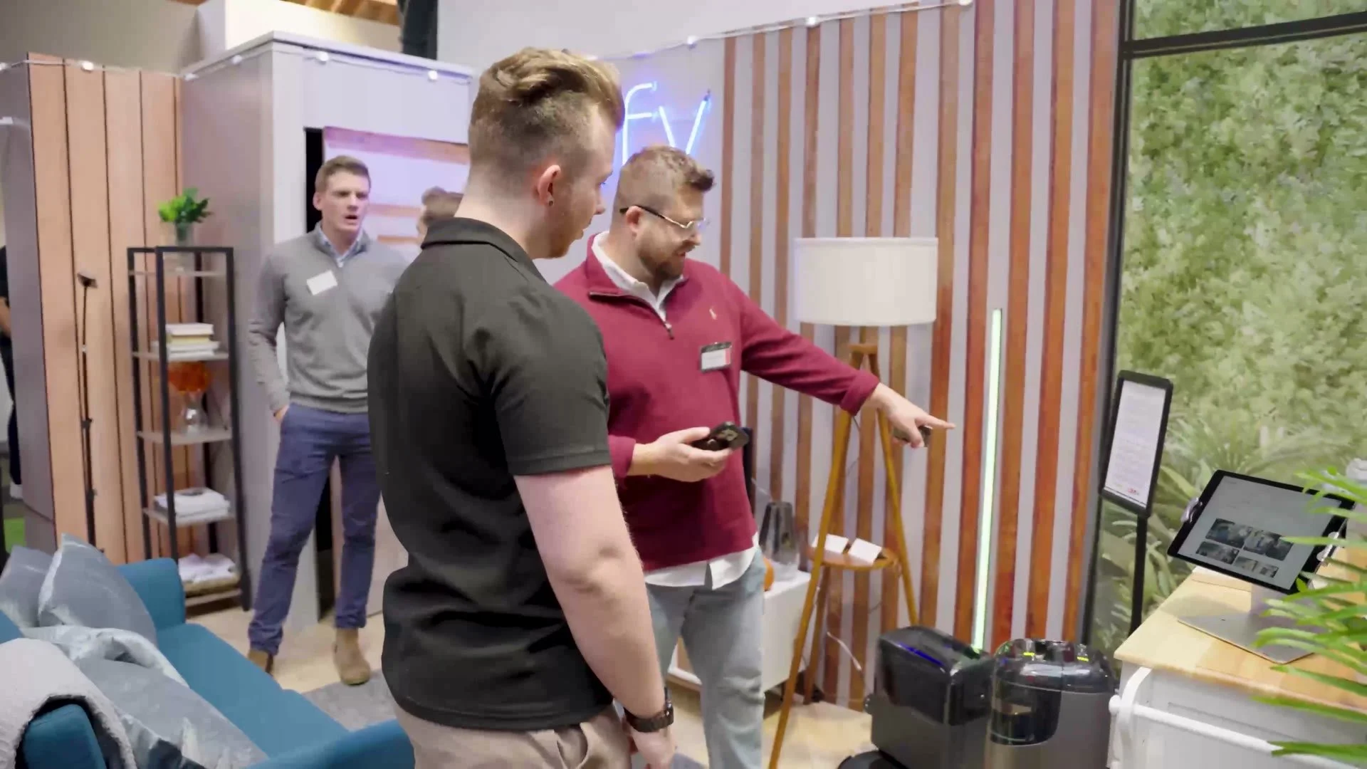 Guests exploring a smart home product room