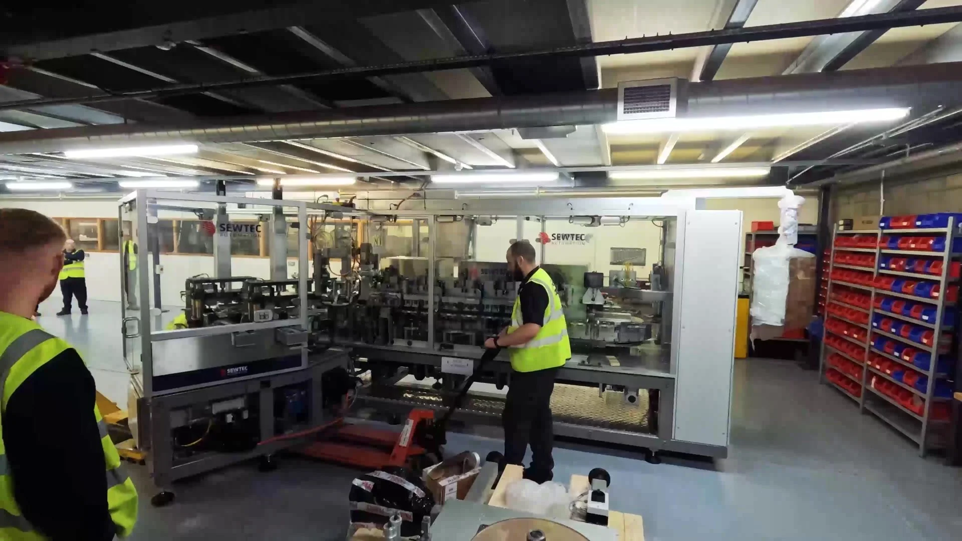 Engineers installing the machine