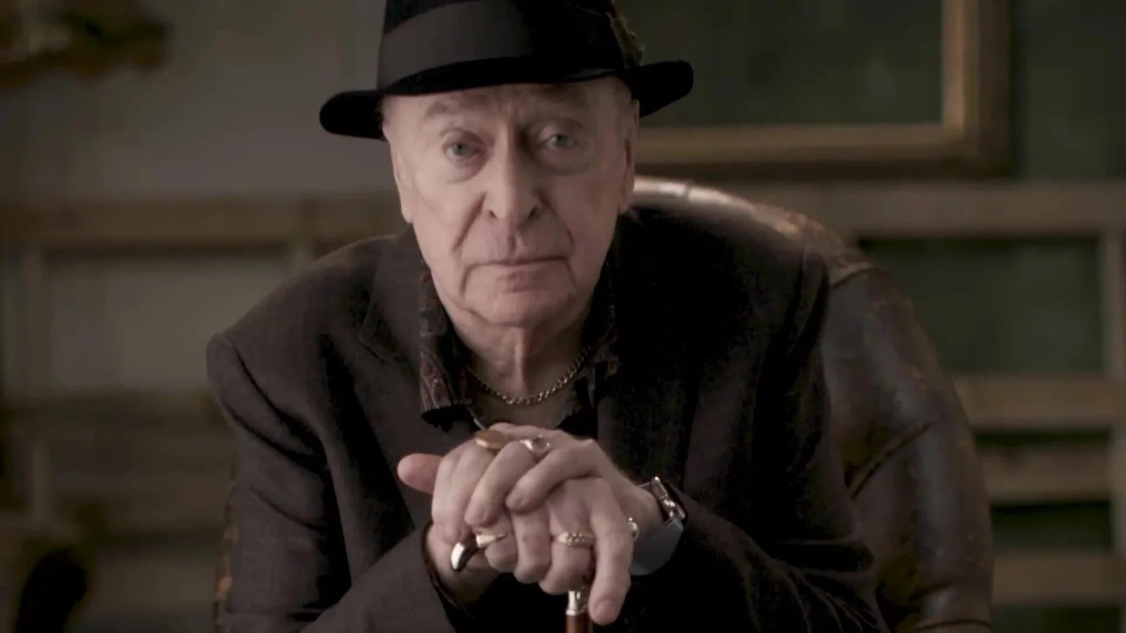 Older character in a hat, from a Sky Cinema pre-roll