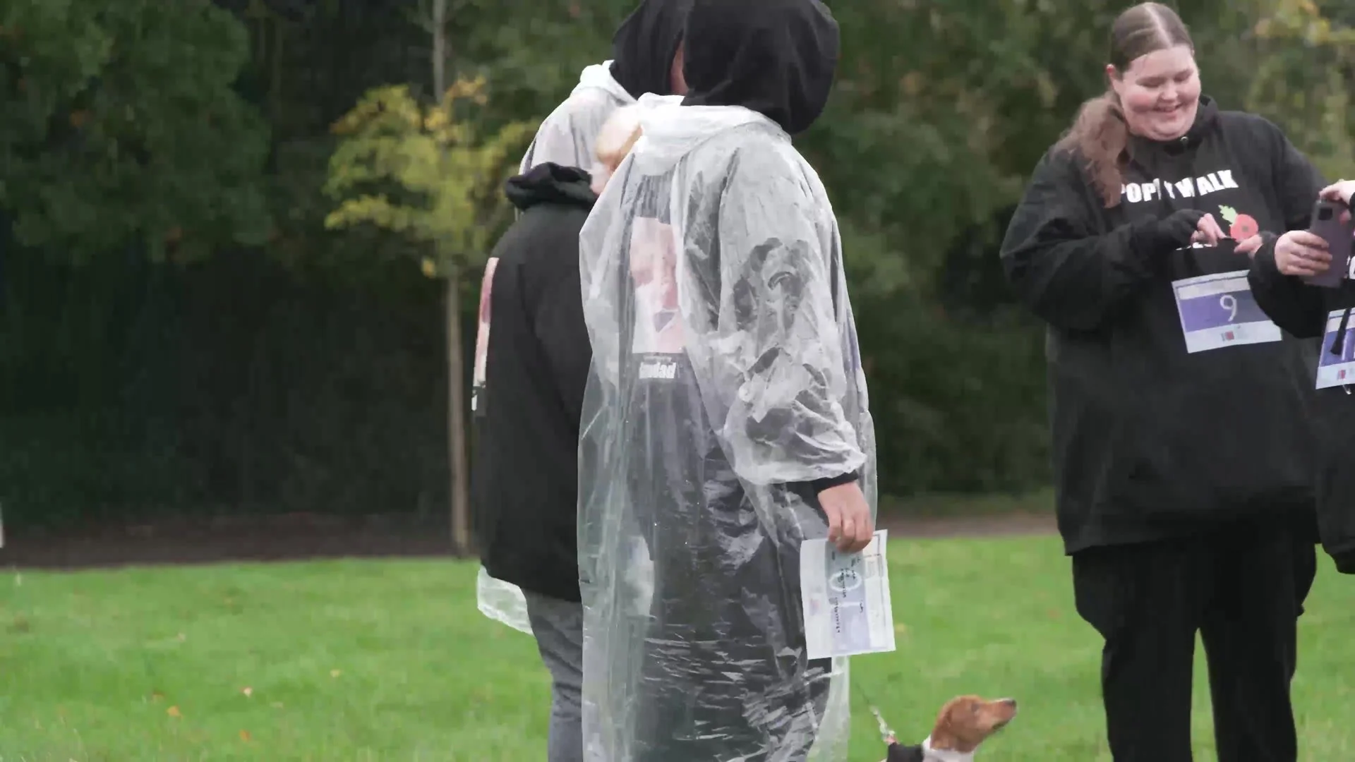 Walkers wearing photos of loved ones