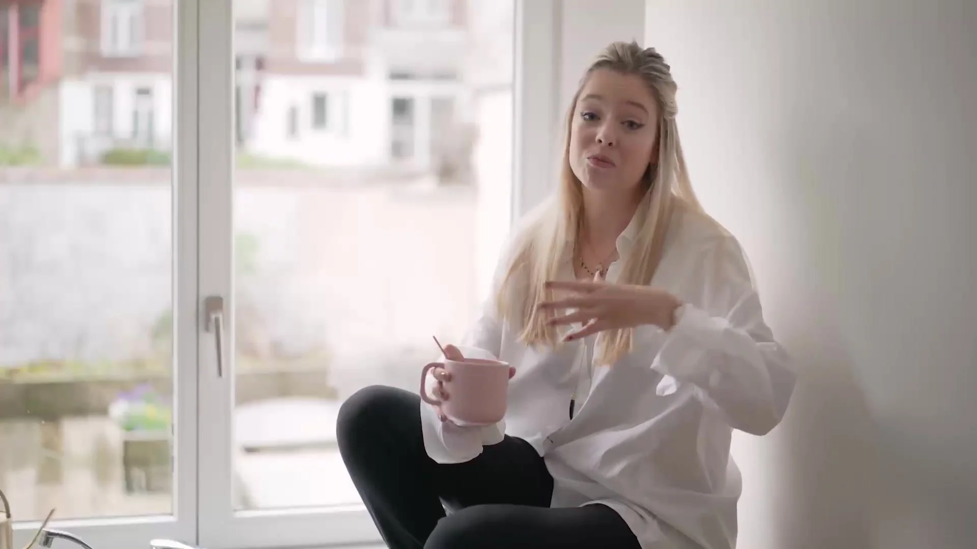 Lifestyle blogger talking to camera at home for the Acer campaign