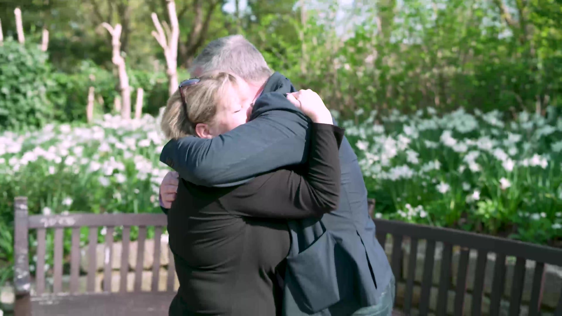 Lee and Jennifer embrace as they meet for the first time