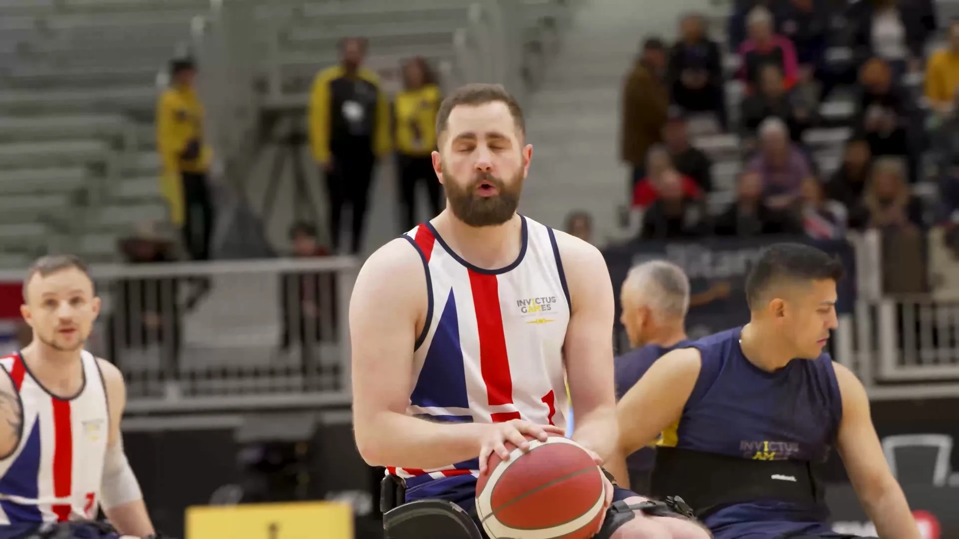Team UK wheelchair basketball player with the ball at the Invictus Games