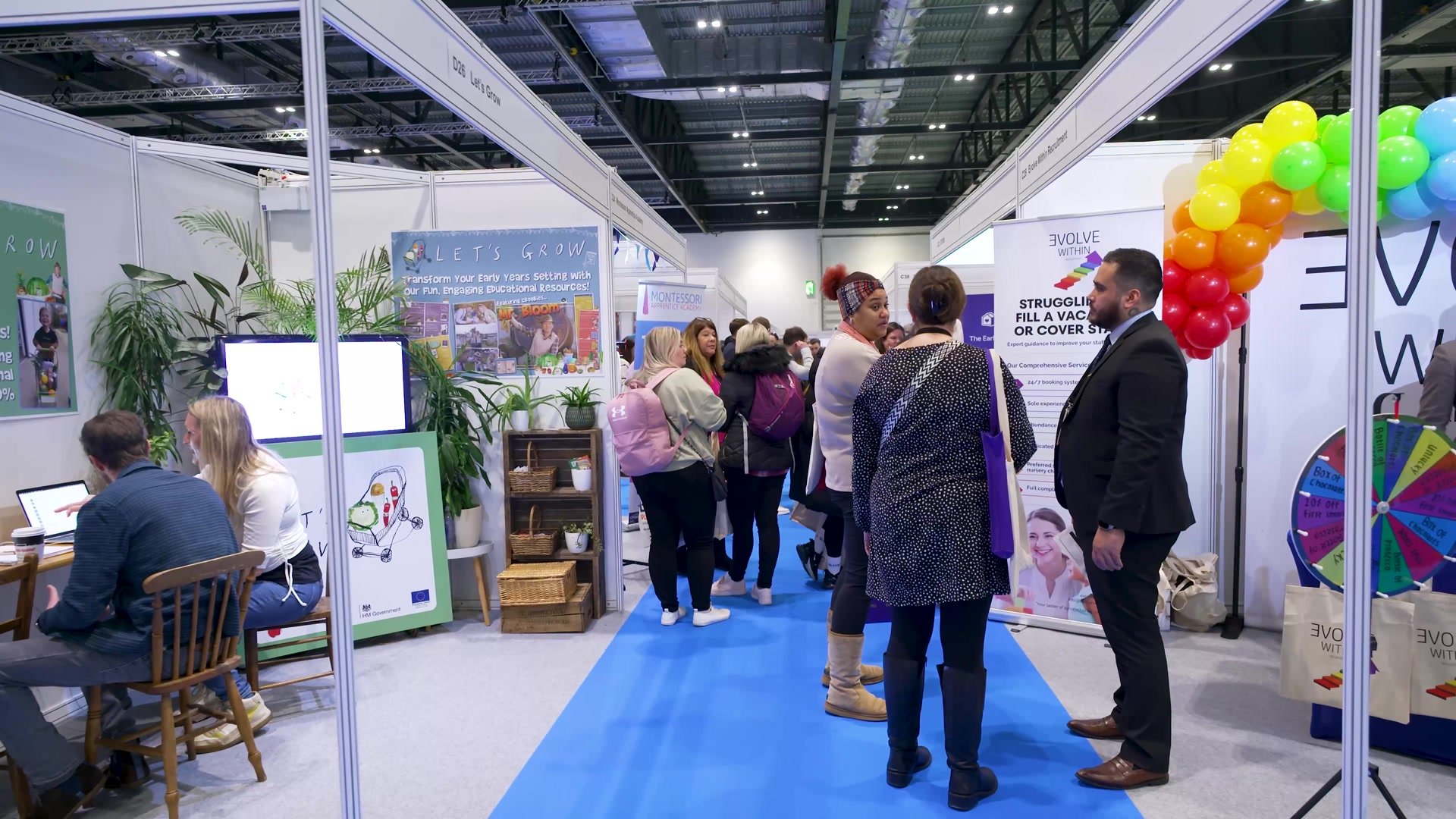 Visitors at the exhibition stands