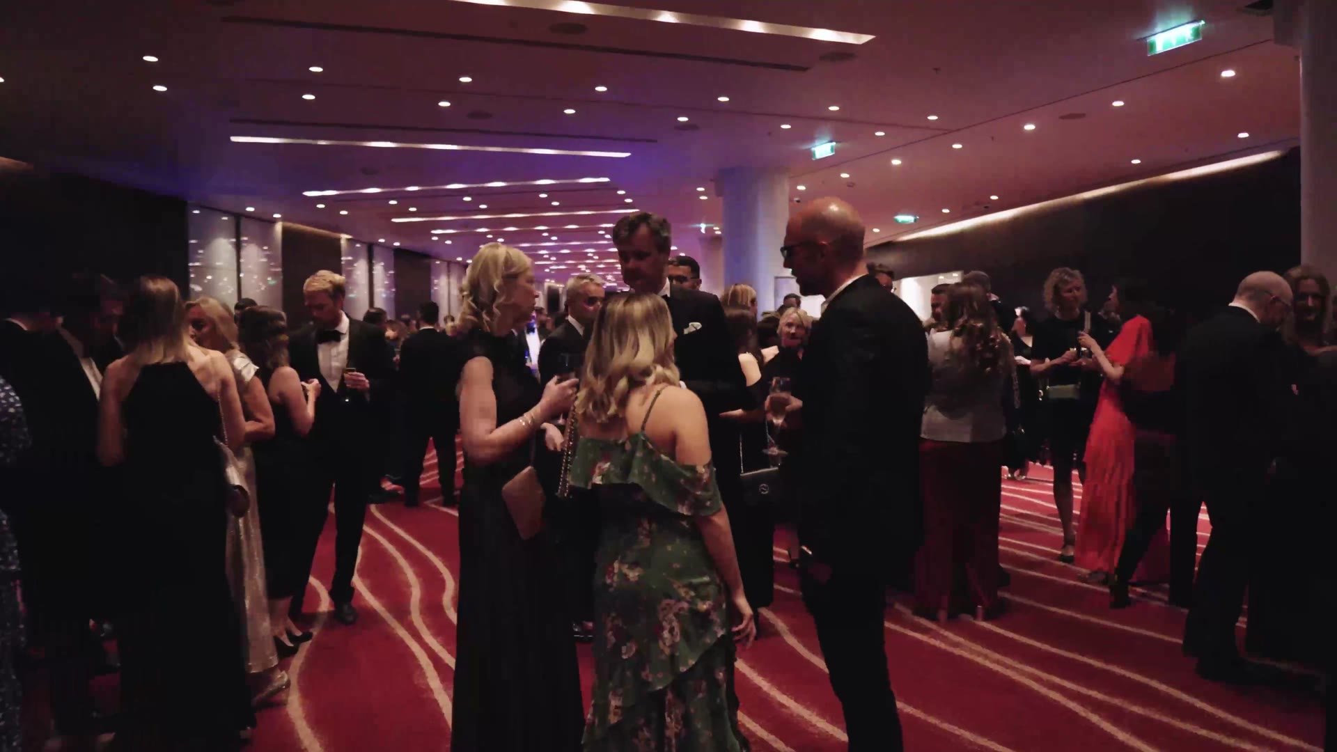 Guests networking before dinner