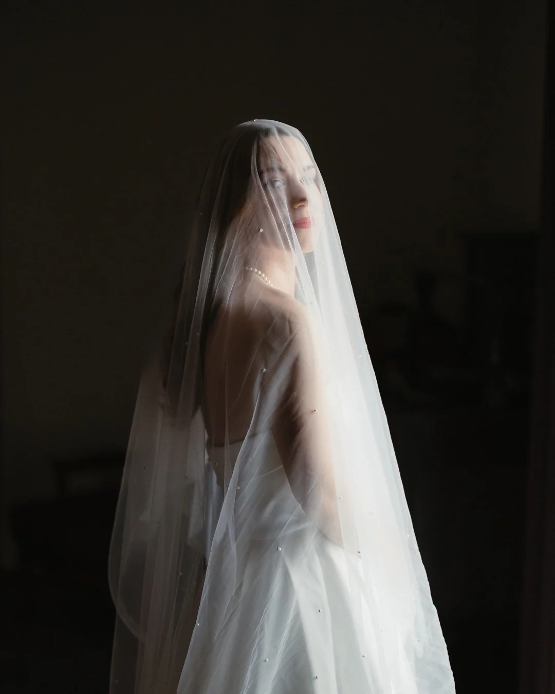 There&rsquo;s something special about the quiet before everything changes.
The soft light, the veil, the deep breath before walking forward.

Not just a bride, a woman feeling it all.
Present. Emotional. Ready. ✨

-

H&aacute; qualquer coisa especial