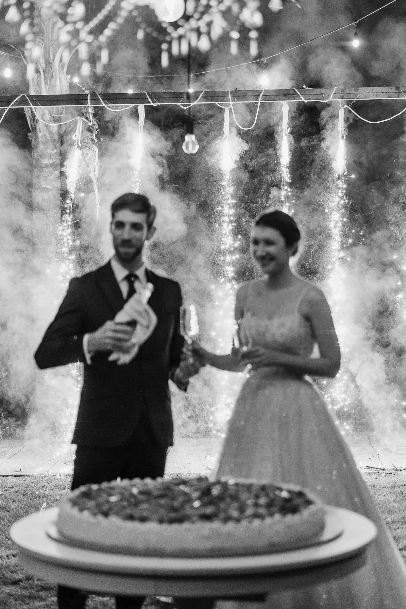 bride and groom cuting a cacke