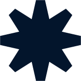 A dark blue, eight-pointed star shape.