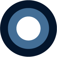 A dark blue circle with a smaller black circle inside, resembling a target or a donut.