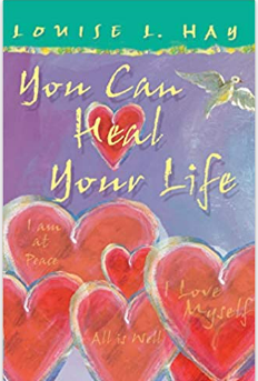 Book cover titled 'You Can Heal Your Life' by Louise L. Hay, featuring red hearts with positive affirmations like 'I am at peace' and 'Love myself,' and a hummingbird flying above.
