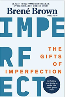 Book cover for 'The Gifts of Imperfection' by Brené Brown, with large, bold blue letters and orange accents on a white background.