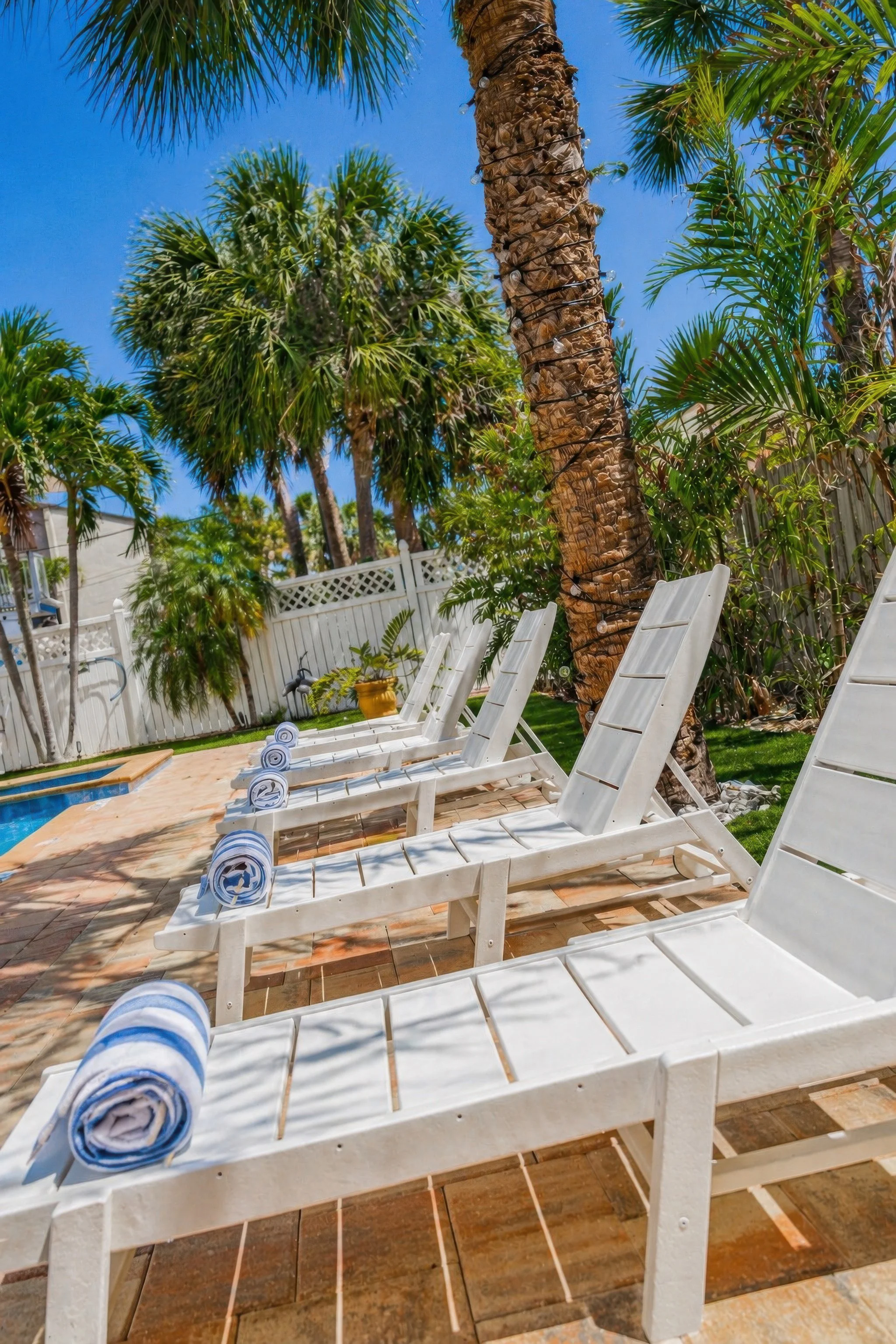 Lounge chairs and beach towels.
