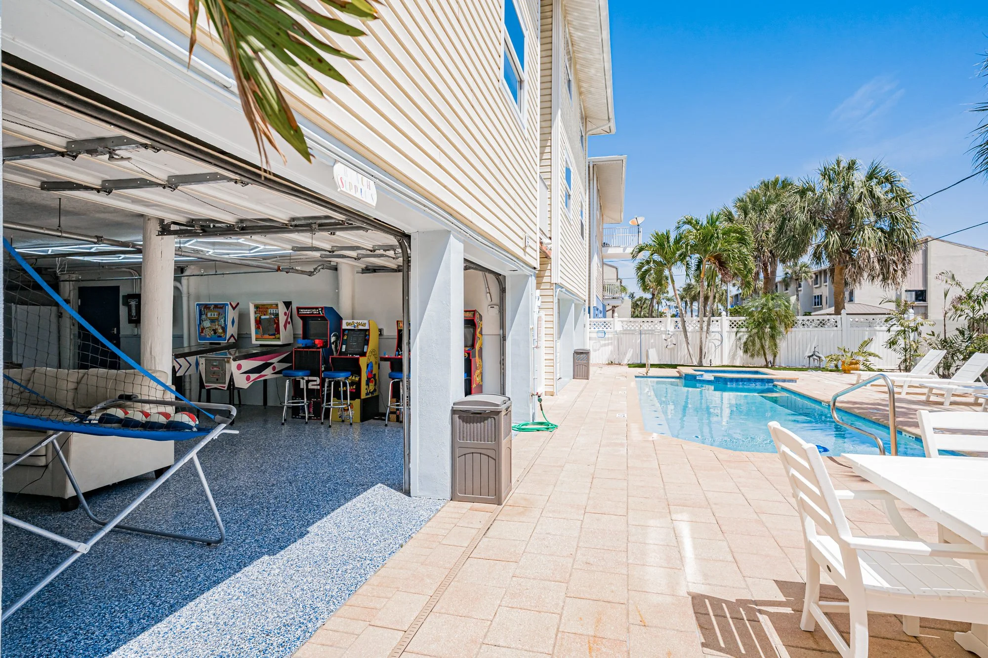 Game room open to pool.