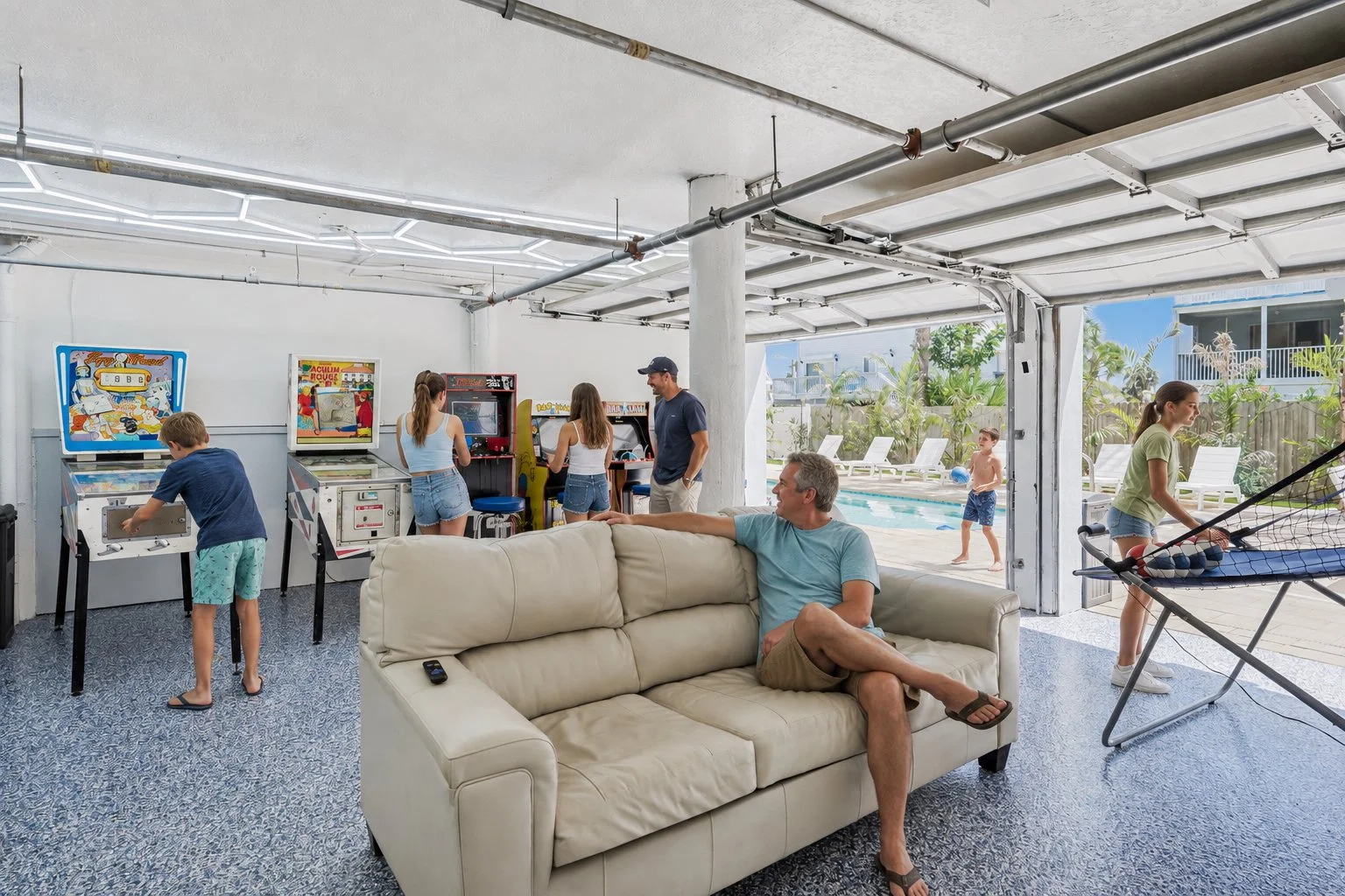 Family members spending time together in the Condo Del Mar game room