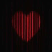 A red heart-shaped soft light against a dark red velvet curtain, creating a quiet and evocative symbol of emotion and intimacy.