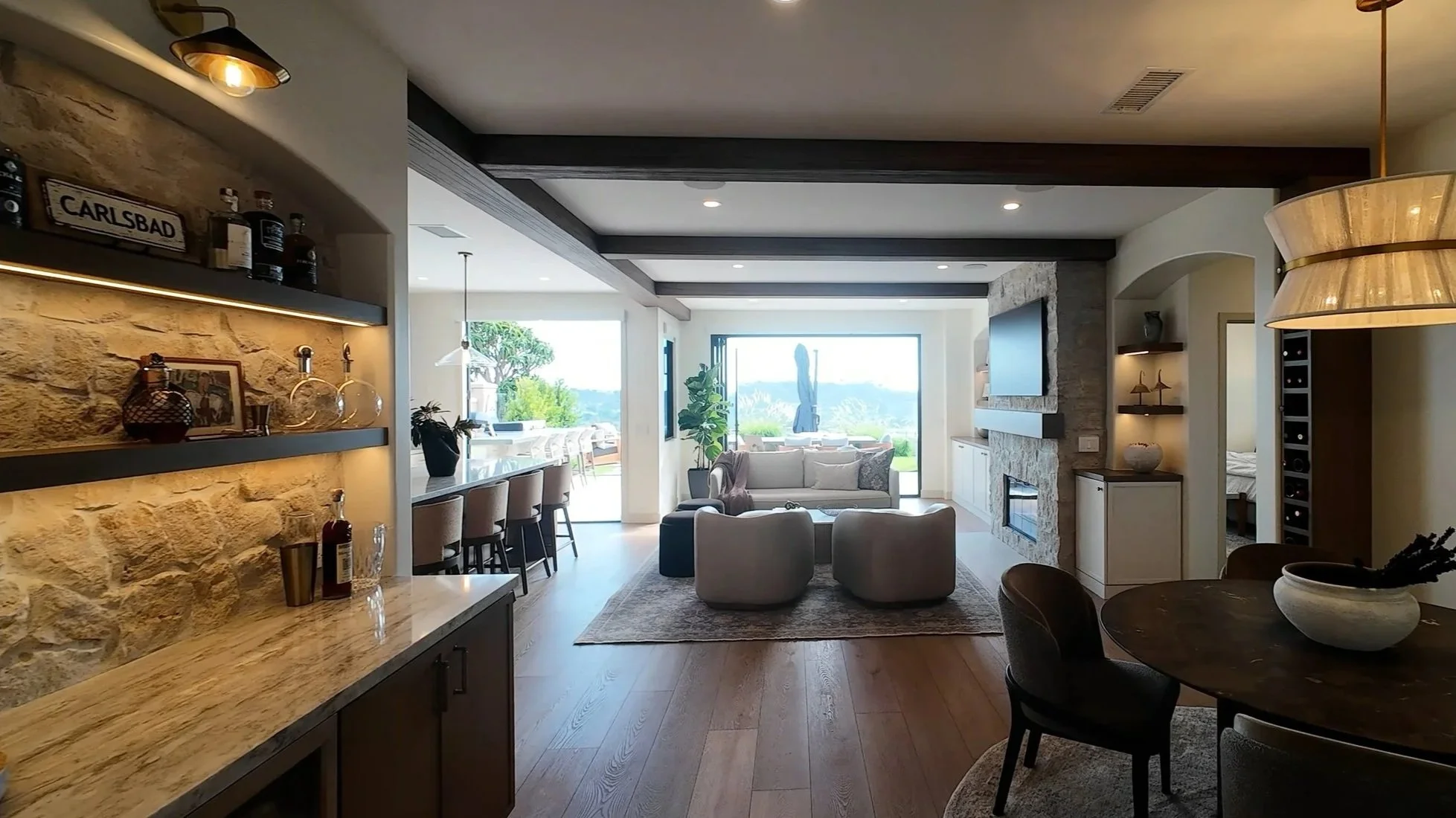 Cinematic Wide shot of remodeled living room interior from Murray Lampert Design Build Remodel commercial - San Diego construction video production
