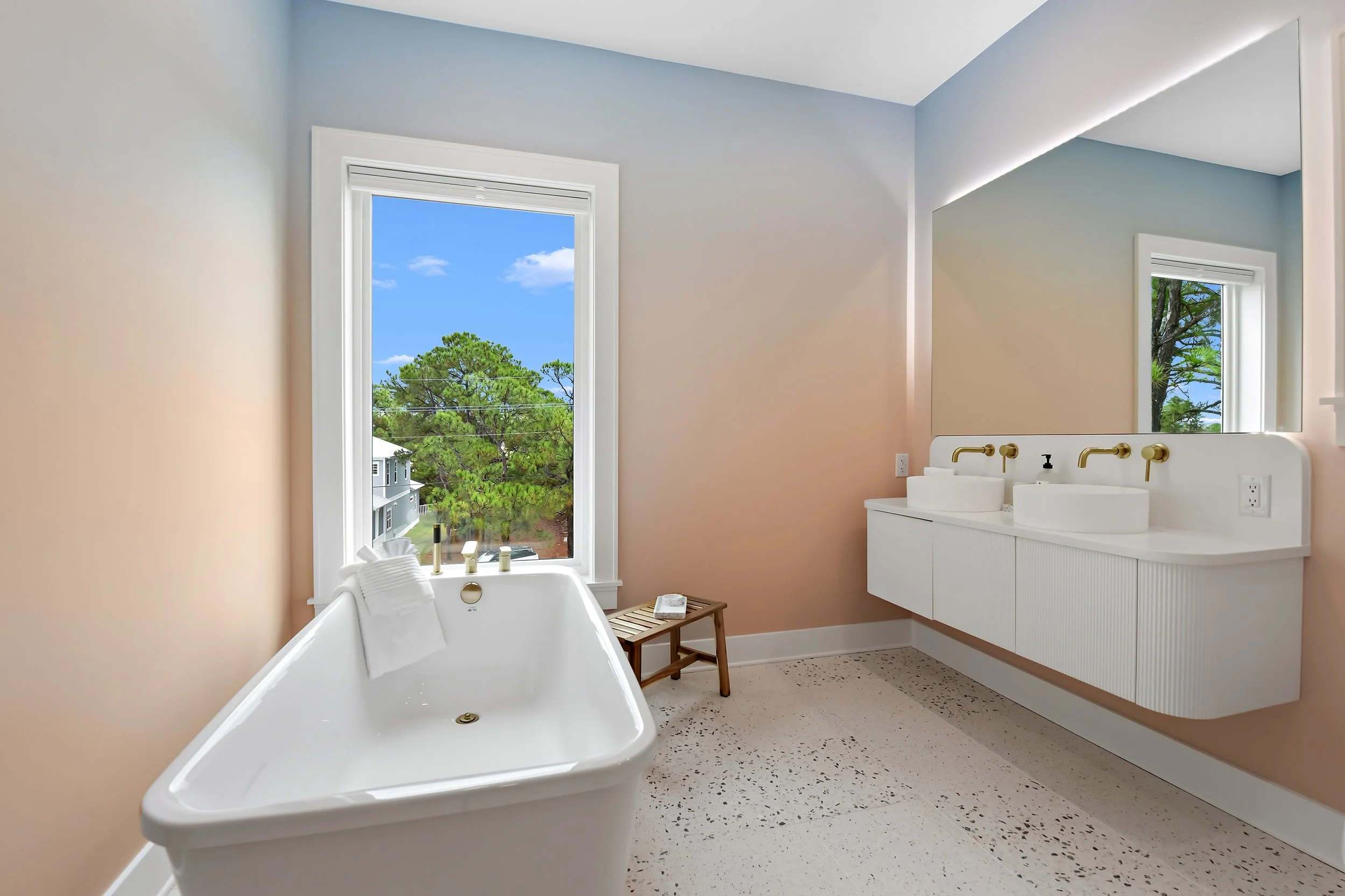 Ensuite bathroom featuring a spacious shower, refined tilework, and modern fixtures.