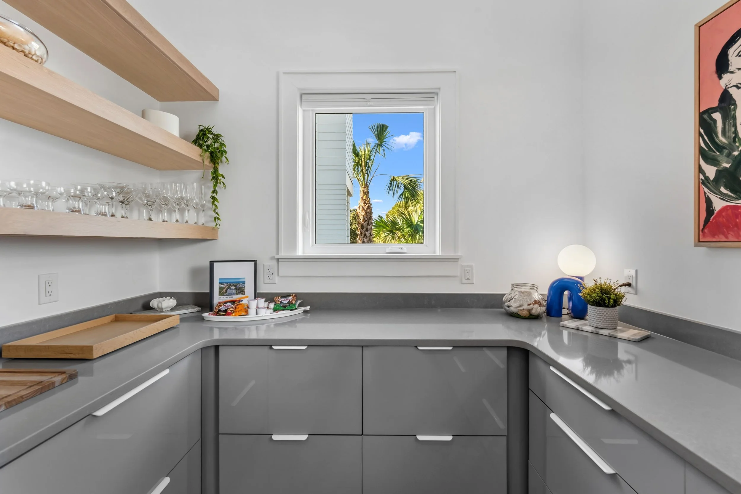 Clean Modern Kitchen with Open Shelving and Natural Light