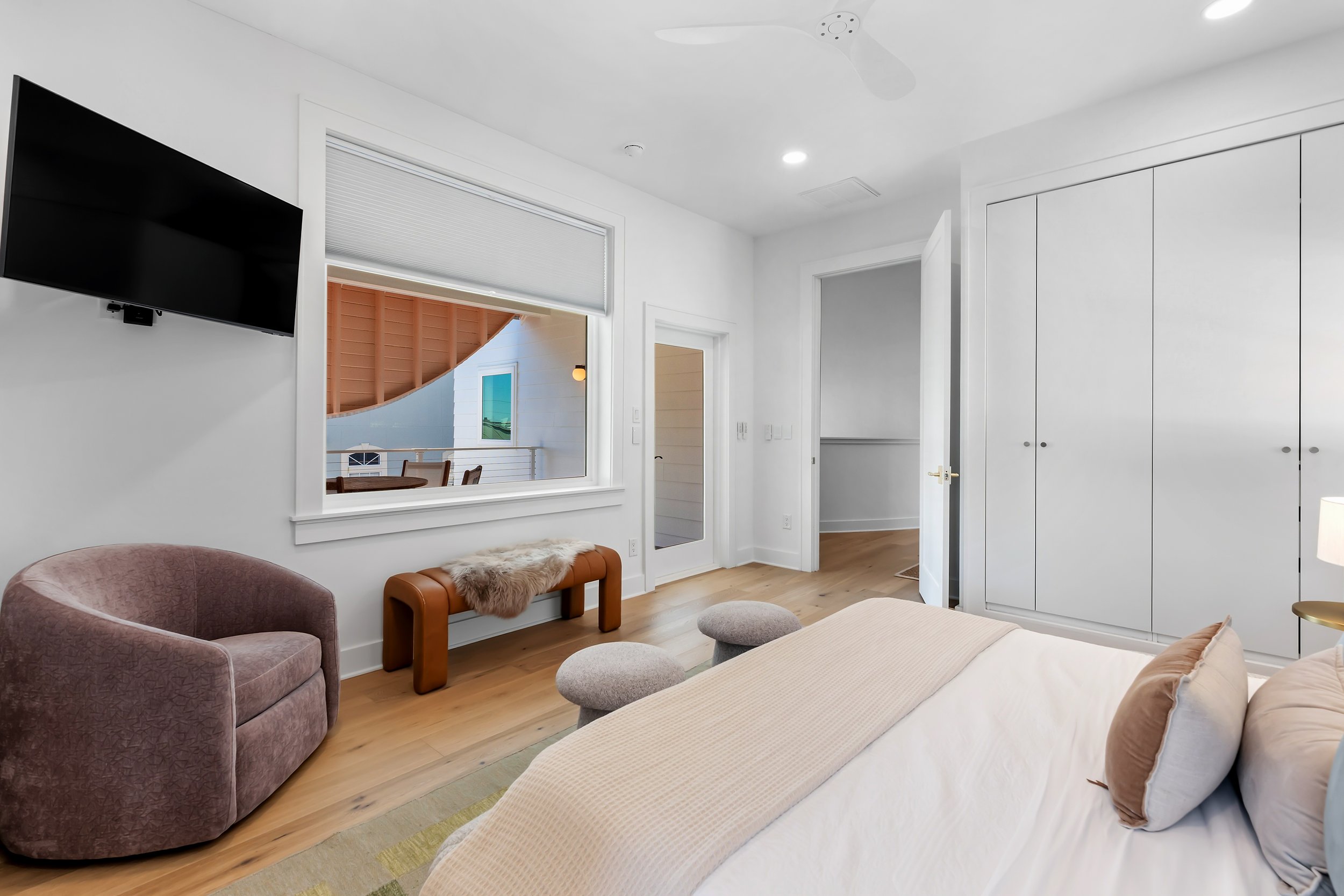 Private bedroom with a king bed, calm coastal palette, and ensuite bathroom for added comfort and privacy.