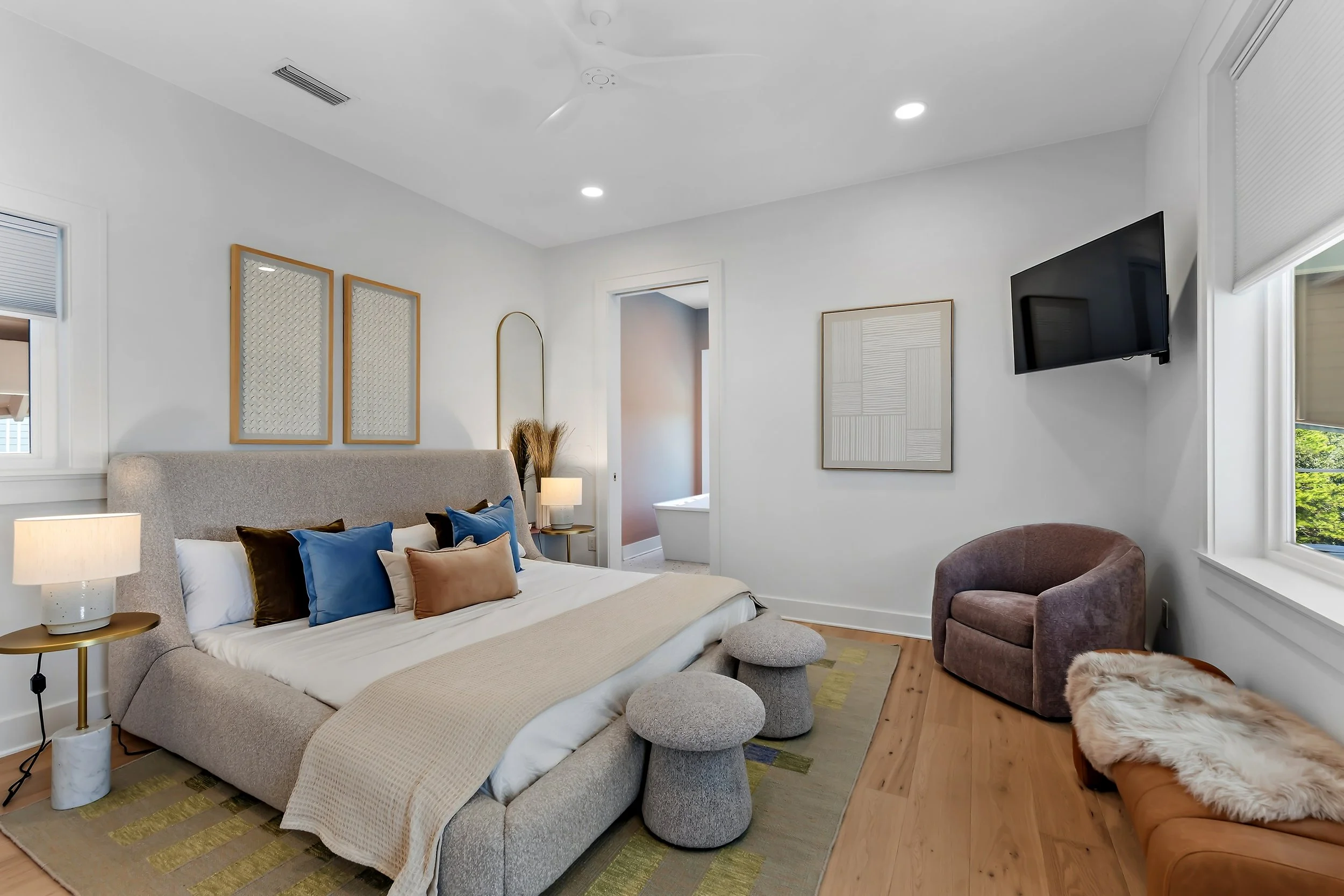 Private bedroom with a king bed, calm coastal palette, and ensuite bathroom for added comfort and privacy.