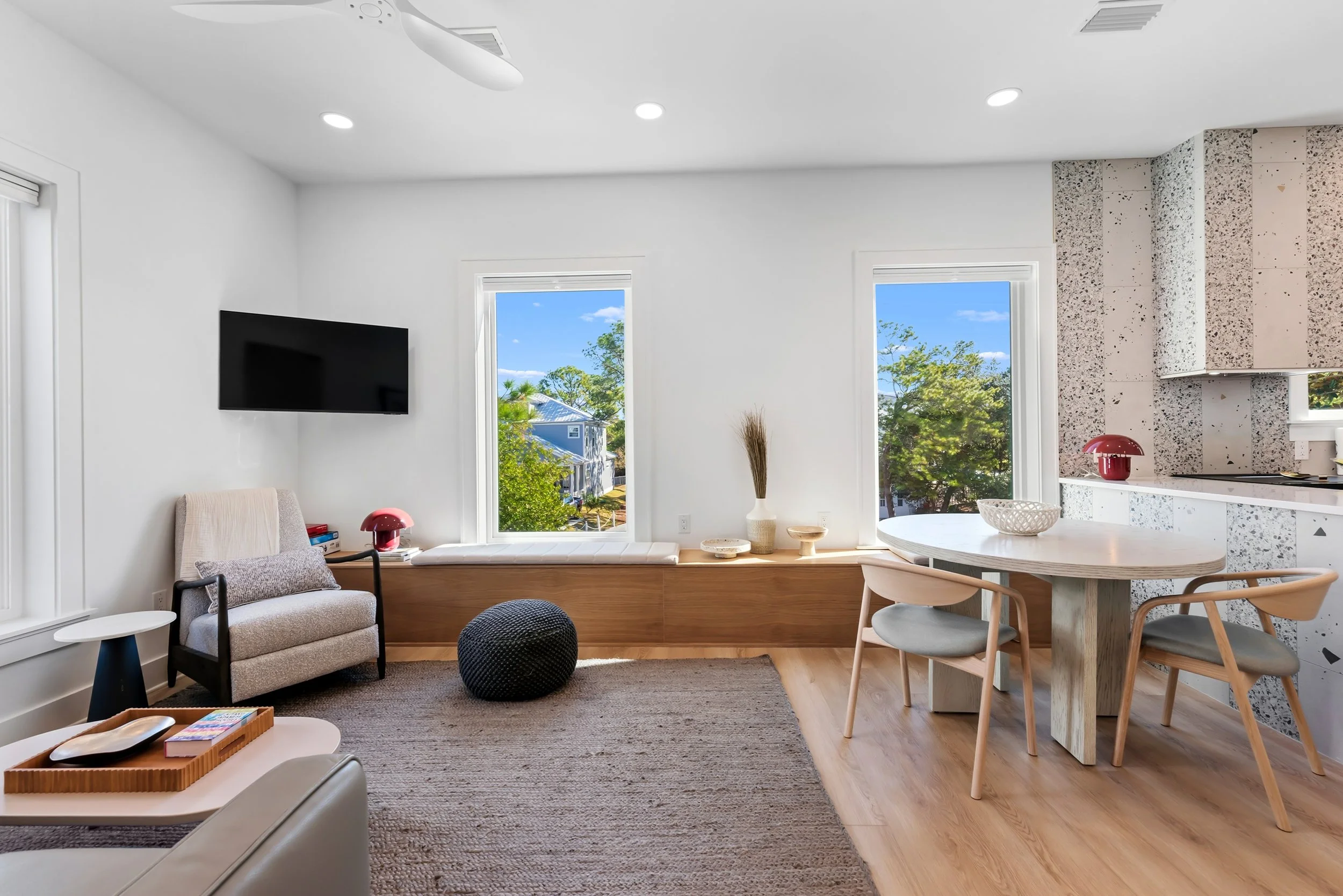 Open-concept guest house kitchen and living area designed for relaxed coastal living along Florida’s Scenic Highway 30A.