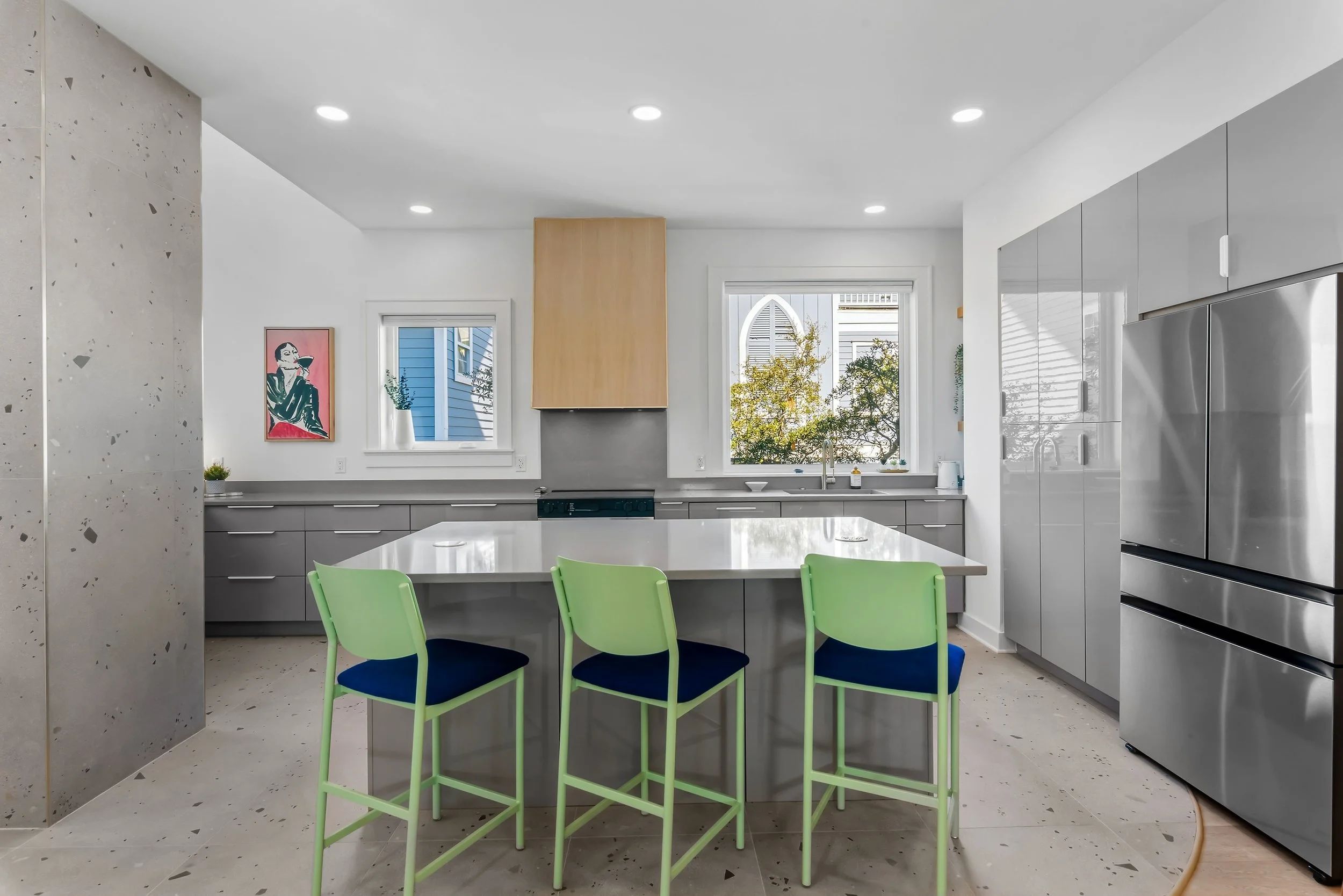 Kitchen bar seating at Kate’s House offers a flexible space for casual dining, morning coffee, or remote work, with comfortable seating and an open layout ideal for co-working on 30A.