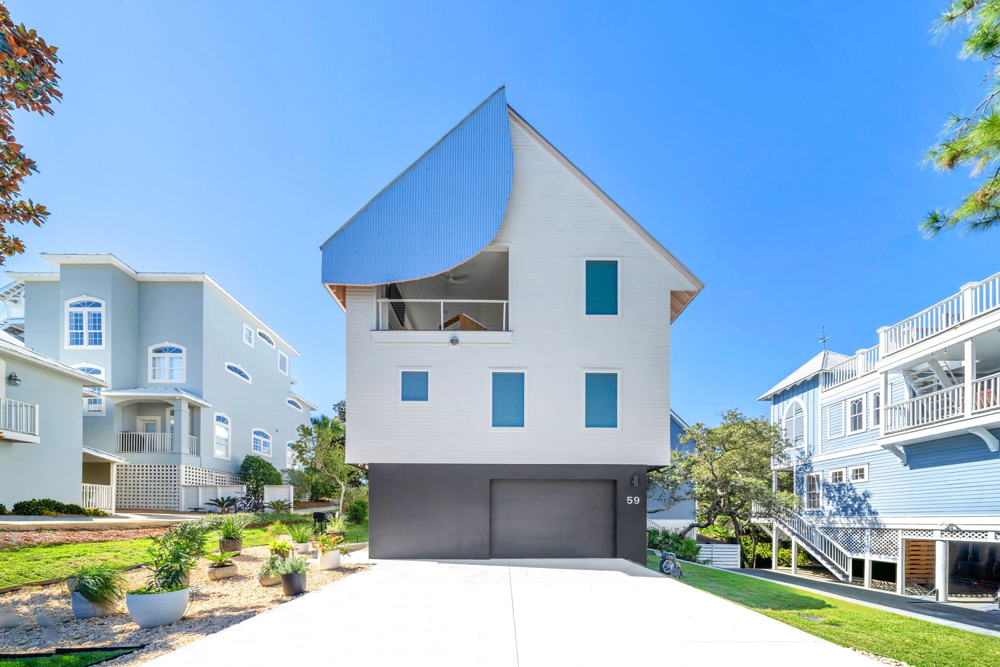 Modern guest house exterior with clean coastal architecture near Florida’s Scenic Highway 30A.