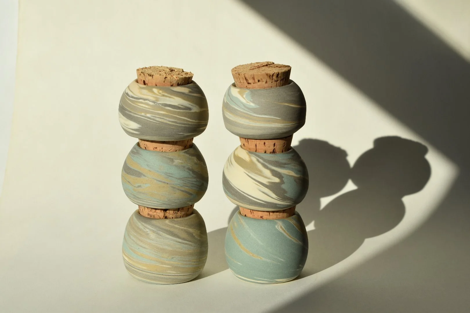 marbled clay ceramic pot with cork top