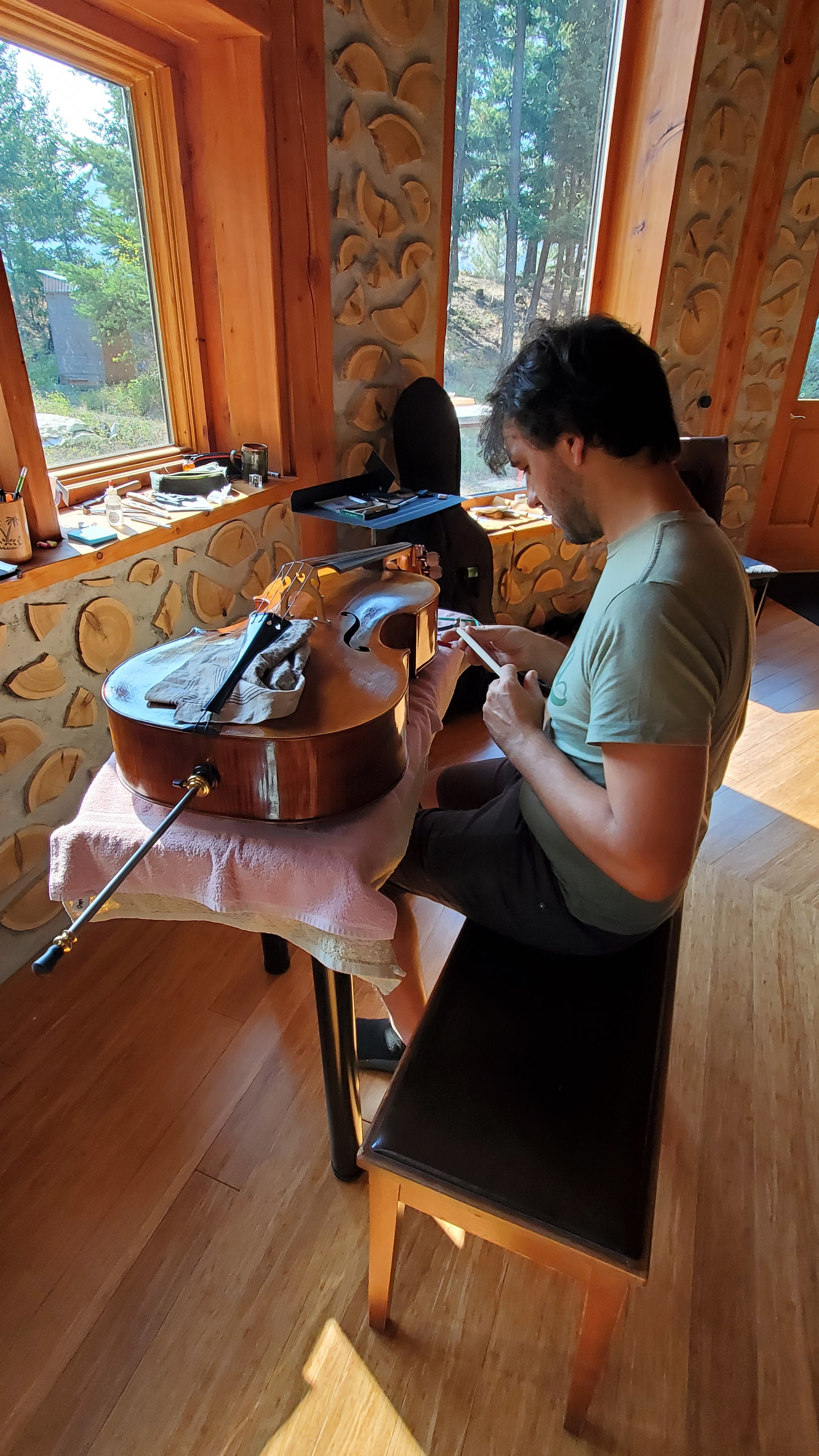 luthier Lucas Castera working on Martin's cello