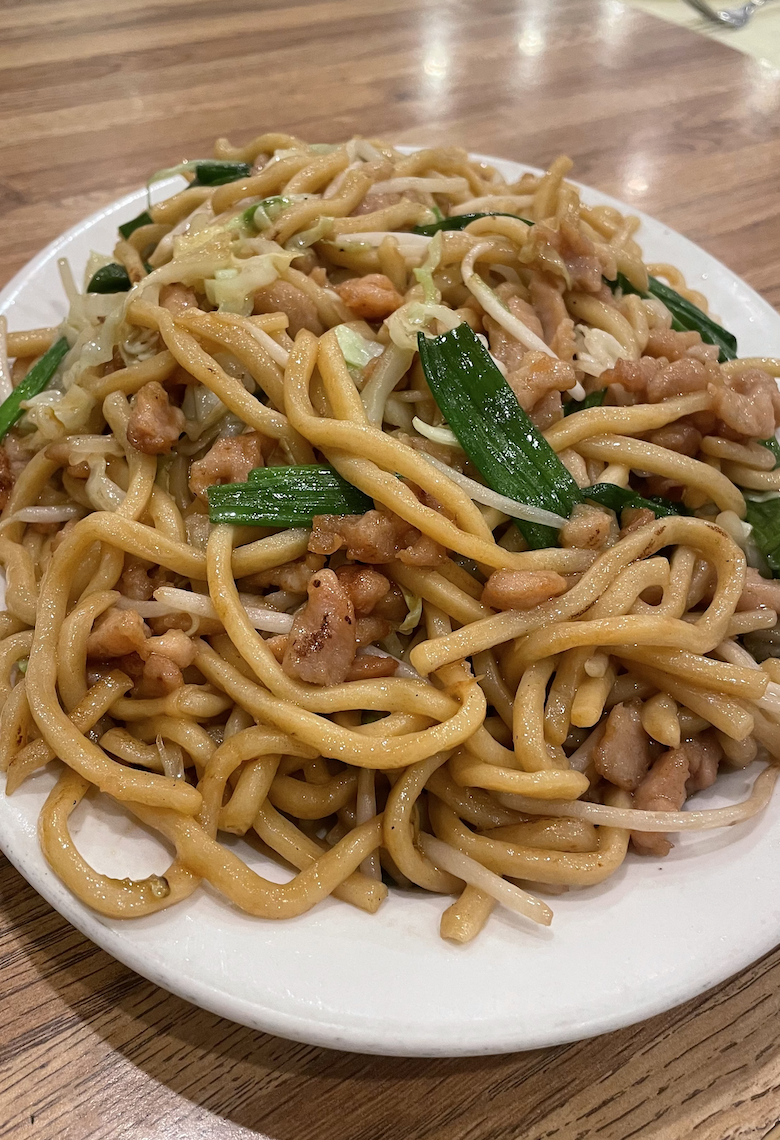 Stir-fried Chicken Chow Mein with tender chicken breast, egg noodles, and crisp vegetables in a savory sauce.