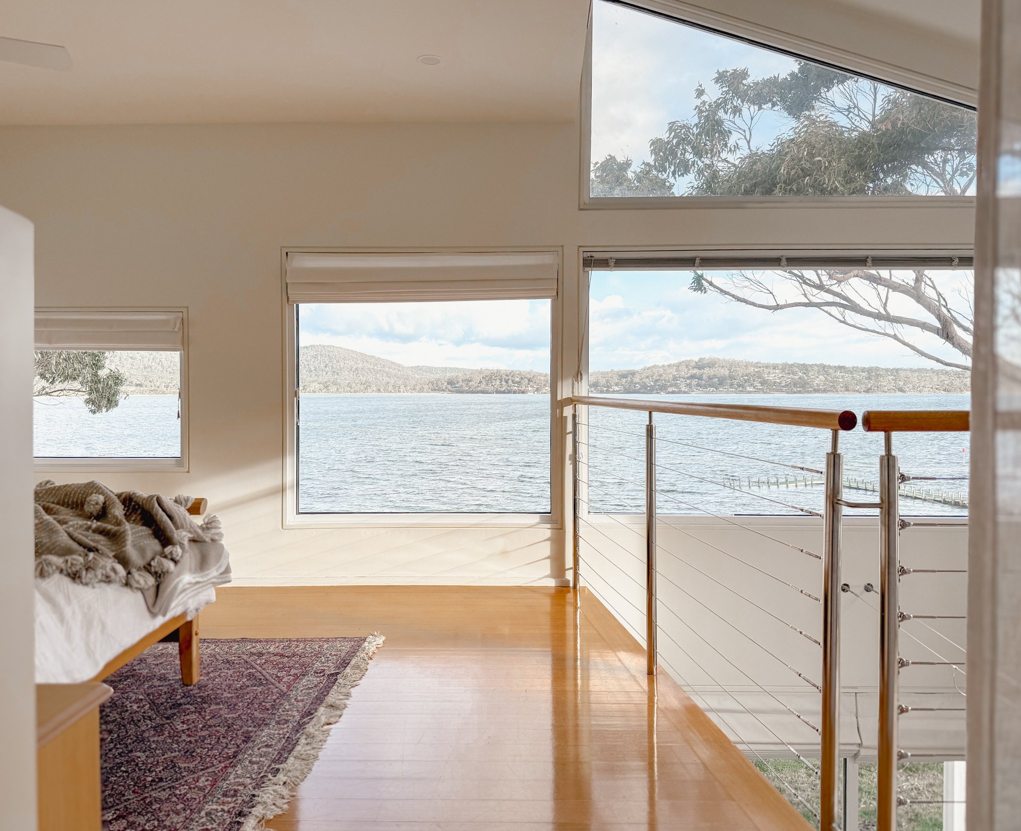A mezzanine master bedroom with great views